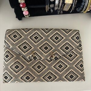 Stella & Dot Geometric Patterned woven Clutch with magnetic closure.